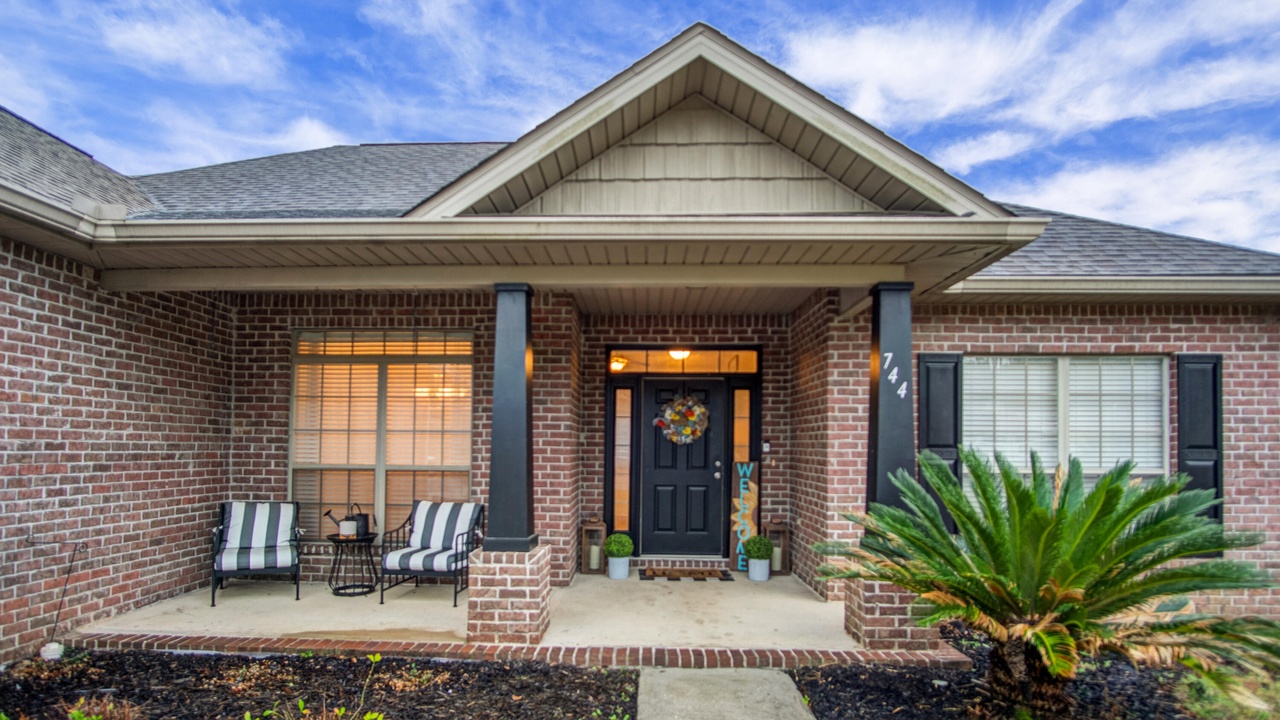 Covered front porch of a Lime Lane home in Crestview